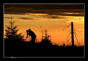 Fotograf im Dämmerlicht